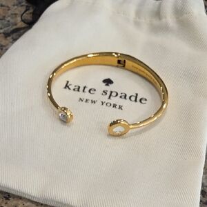 kate spade gold-tone open spade cuff bracelet with crystal end